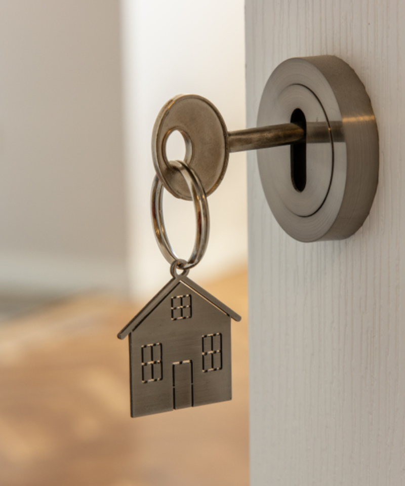 Key in door lock with home keyring